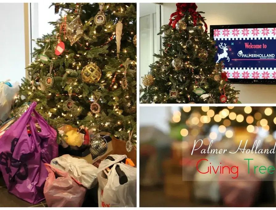 Christmas Tree with gifts in Palmer Holland lobby